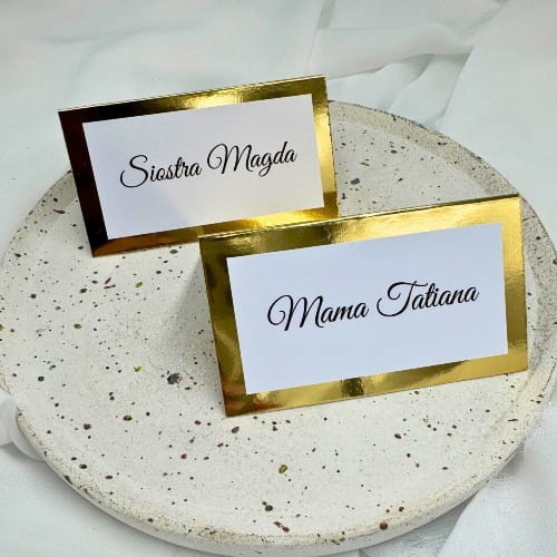 Elegancka dwustronna winietka ślubna z złotą ramką i personalizowanym imieniem na białym tle